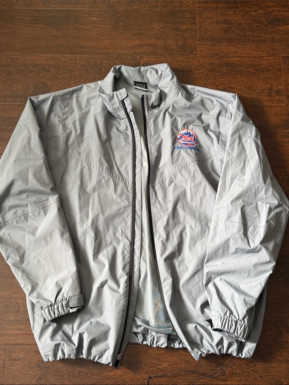 Nike Light Gray Men's Windbreaker with Embroidered Team Patch